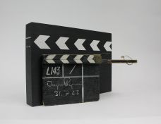 ORIGINAL SIGNED AND DATED CLAPPER BOARD USED IN THE PRODUCTION OF 'TYSTNADEN' [THE SILENCE]