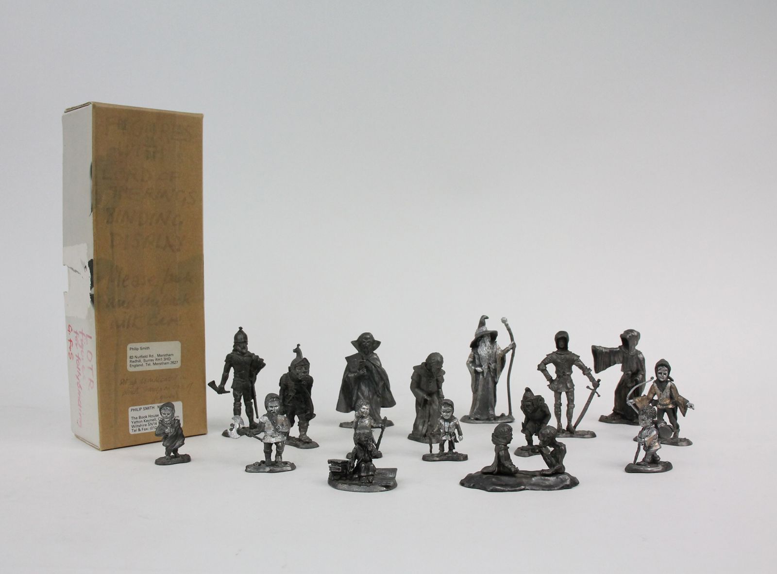 A GROUP OF 16 METAL FIGURES FOR DISPLAY WITH PHILIP SMITH'S LORD OF THE RINGS BOOK BINDINGS -  image 1