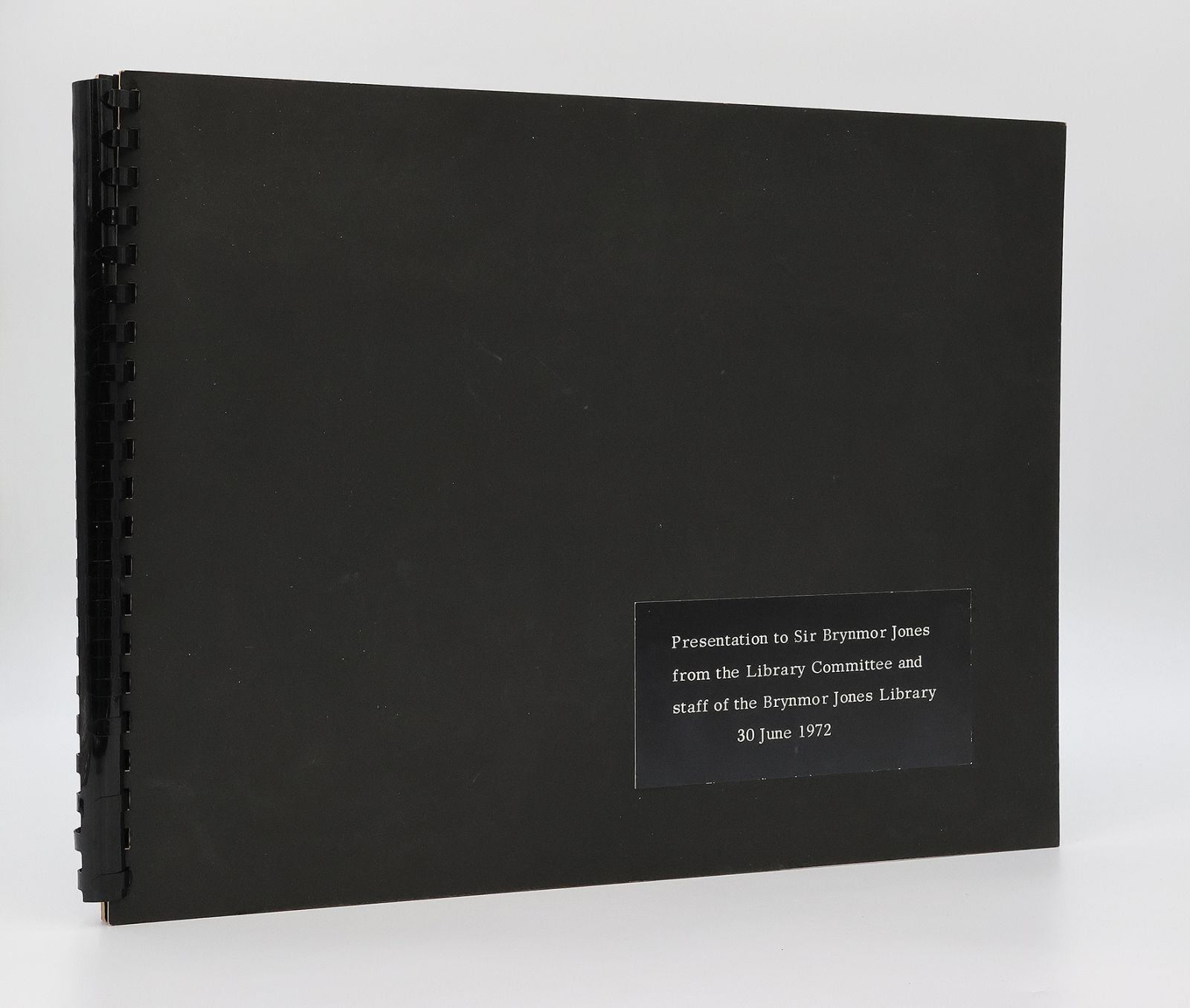 A PHOTOGRAPH ALBUM RECORDING THE OCCASION OF HE CEREMONY TO MARK THE RETIREMENT OF SIR BRYNMOR JONES ON THE 30th JUNE 1972; WITH TWO OF THE GIFTS PRESENTED TO JONES AT THE CEREMONY: A FRAMED HAND-COLOURED MAP BY WENCESLAUS HOLLAR OF HULL (c. 1642) AND A COPY OF THE VICTORIA HISTORY OF THE COUNTY OF YORK, EAST RIDING VOL. 1. -  image 2