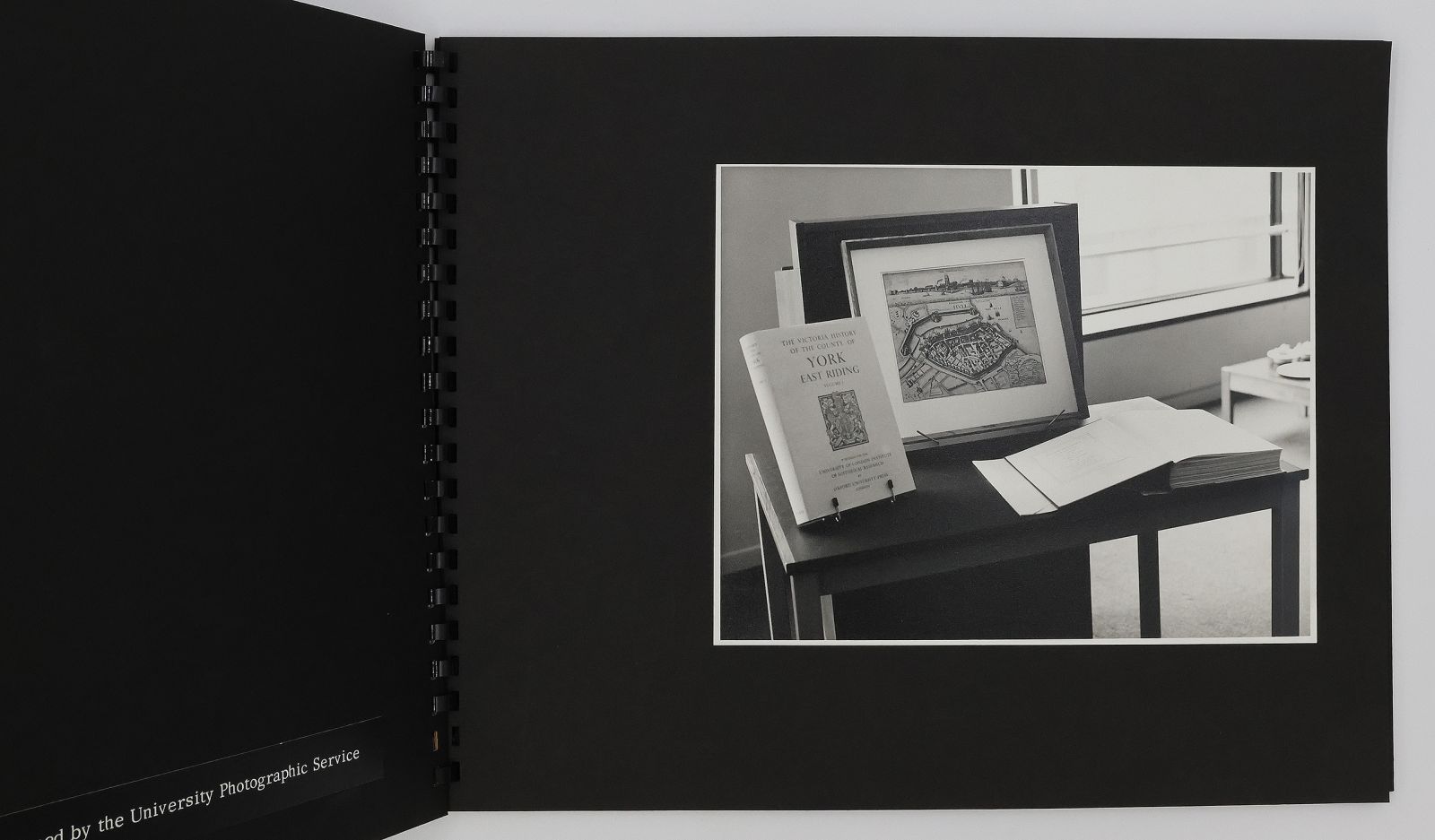 A PHOTOGRAPH ALBUM RECORDING THE OCCASION OF HE CEREMONY TO MARK THE RETIREMENT OF SIR BRYNMOR JONES ON THE 30th JUNE 1972; WITH TWO OF THE GIFTS PRESENTED TO JONES AT THE CEREMONY: A FRAMED HAND-COLOURED MAP BY WENCESLAUS HOLLAR OF HULL (c. 1642) AND A COPY OF THE VICTORIA HISTORY OF THE COUNTY OF YORK, EAST RIDING VOL. 1. -  image 3