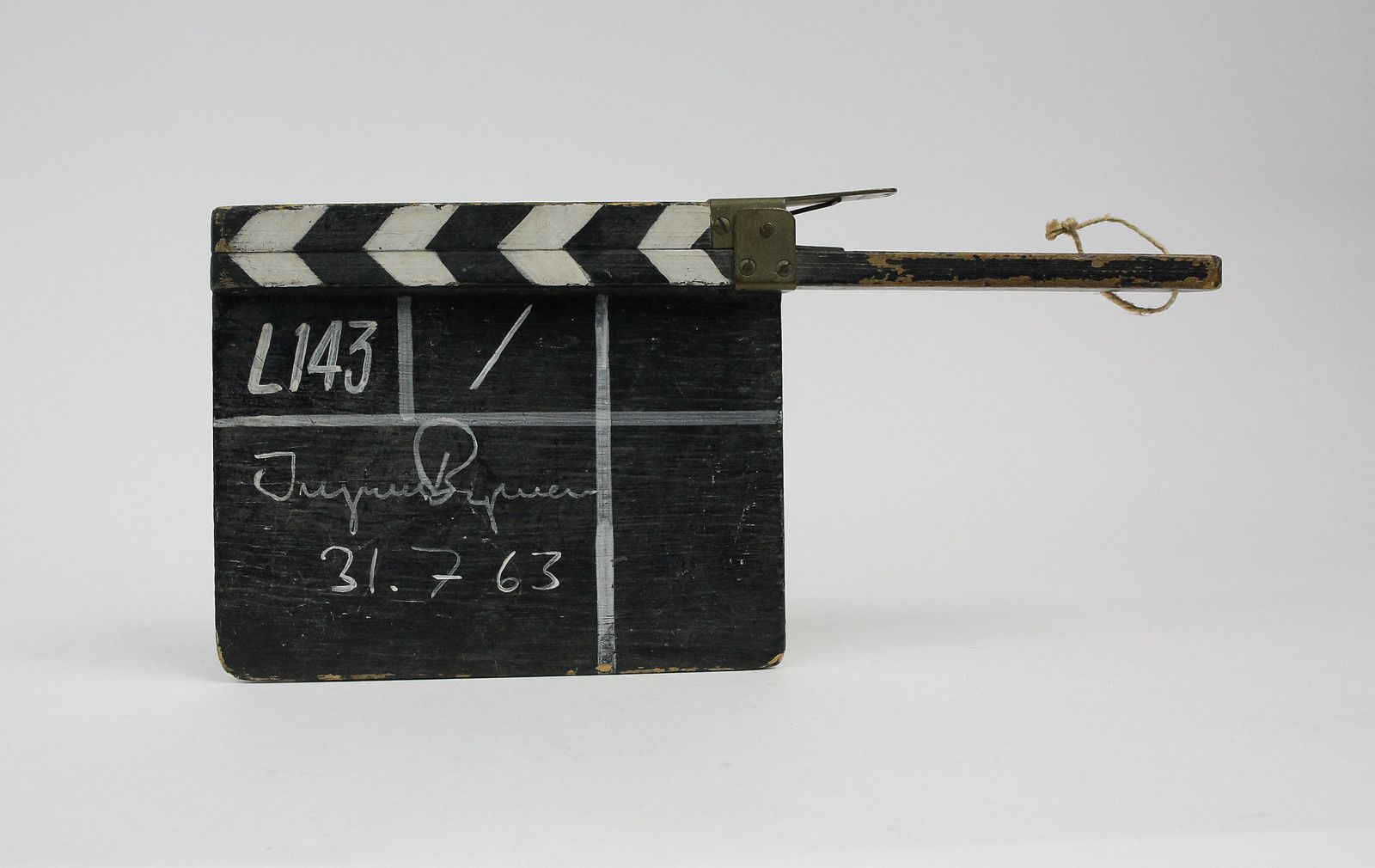 ORIGINAL SIGNED AND DATED CLAPPER BOARD USED IN THE PRODUCTION OF 'TYSTNADEN' [THE SILENCE] -  image 2