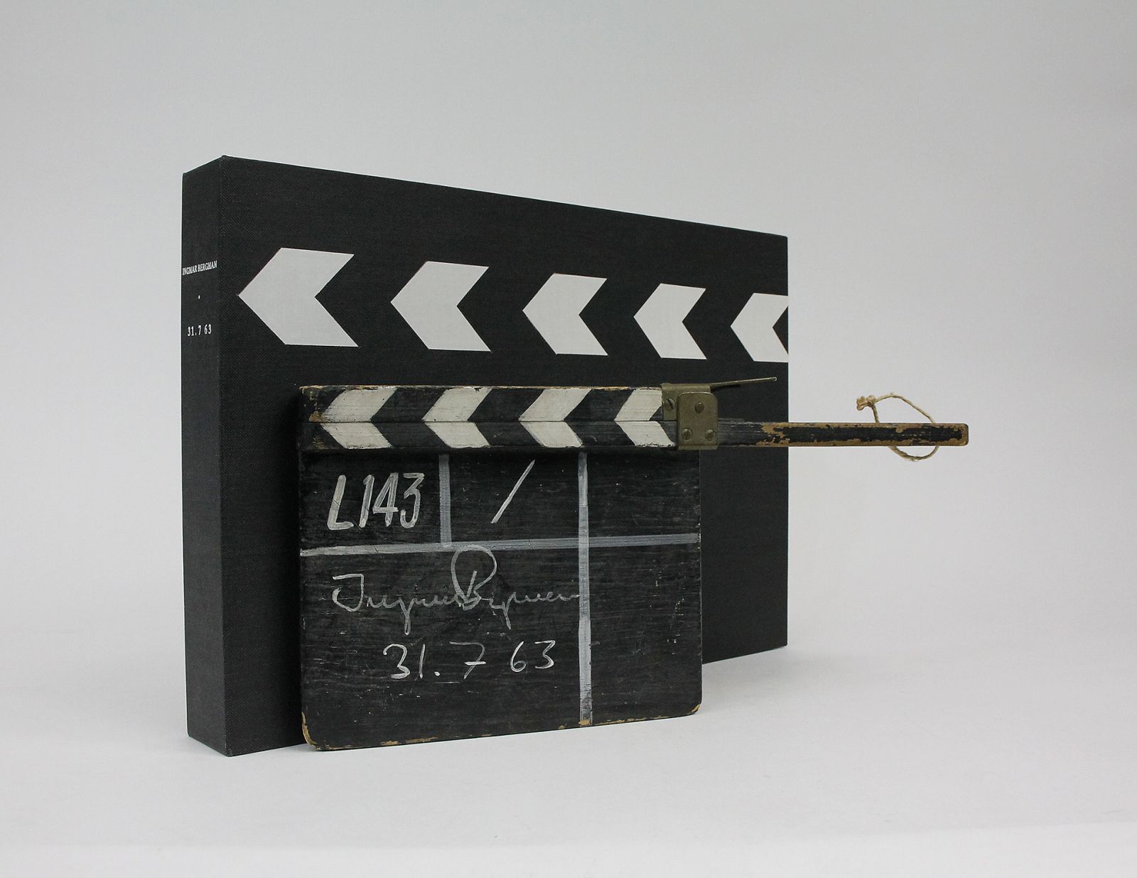ORIGINAL SIGNED AND DATED CLAPPER BOARD USED IN THE PRODUCTION OF 'TYSTNADEN' [THE SILENCE] -  image 1